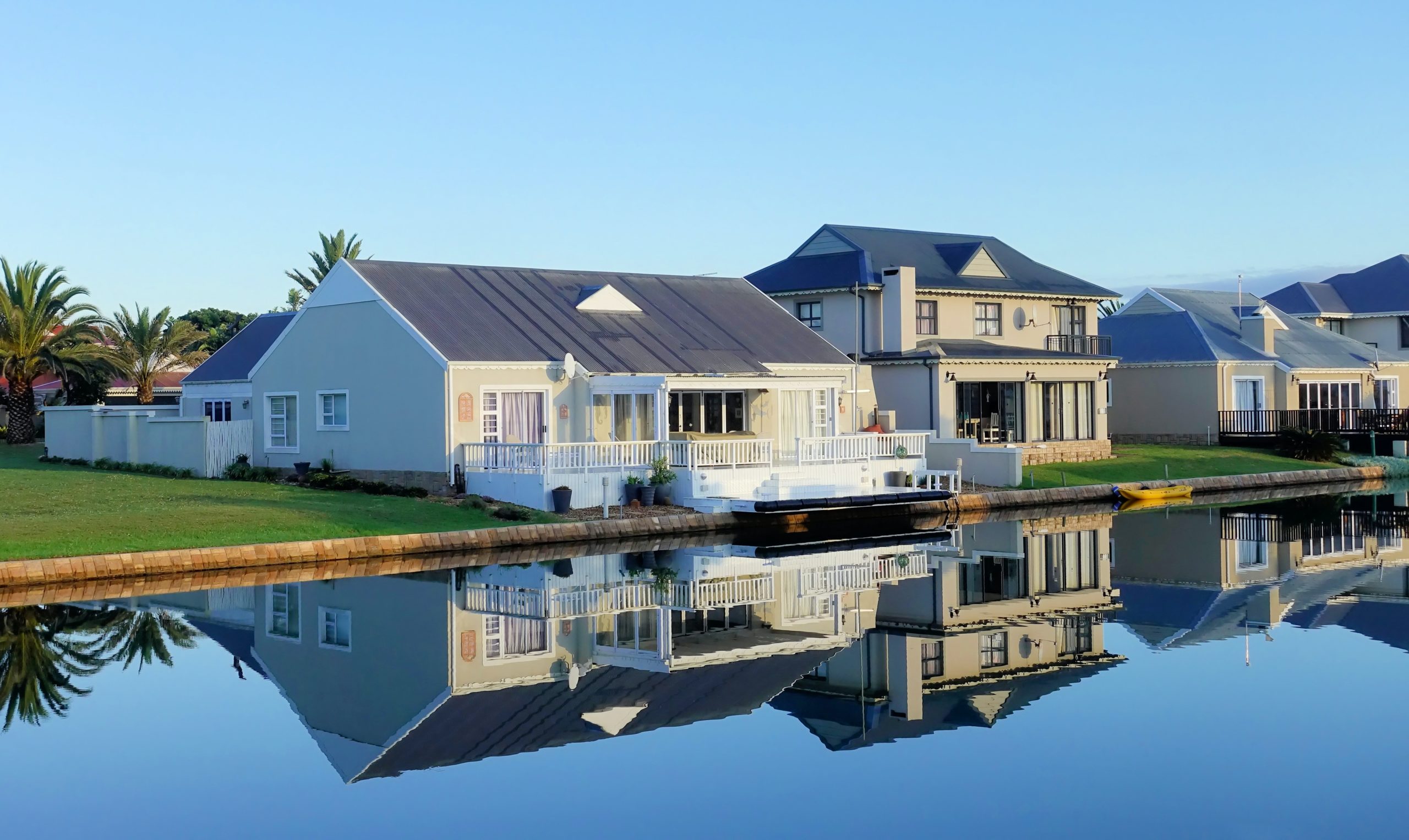 Houses beside body of water